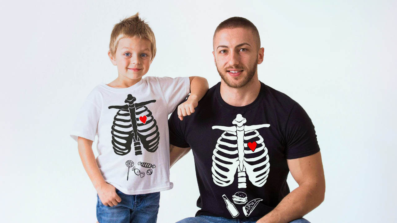 skeleton rib cage, skeleton t-shirt, rib cage design, skeleton imagery, skeleton fashion, skeleton rib cage t-shirt, glow-in-the-dark t-shirt, heart motif t-shirt, punk fashion, gothic fashion, vintage skeleton t-shirt, halloween t-shirt, skeleton print